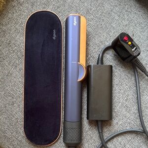 Authentic Dyson hair styler in Prussian blue with  rich copper trim